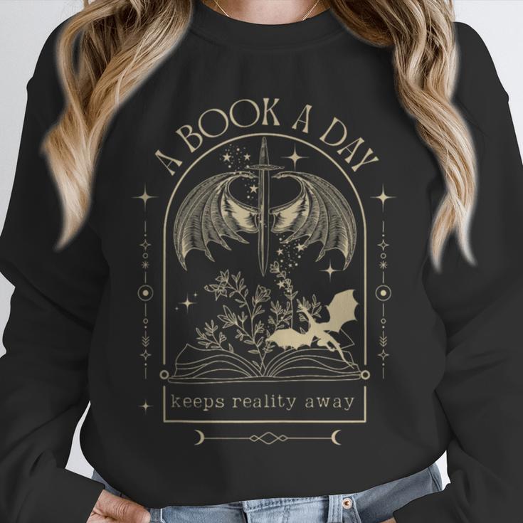Vintage A Book a Day Keeps Reality Away Spicy Book Readers Unisex Sweatshirt