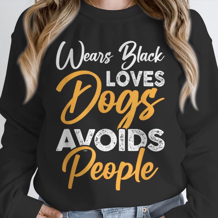 Wears Loves Dogs Avoids People I Introvert Unisex Sweatshirt
