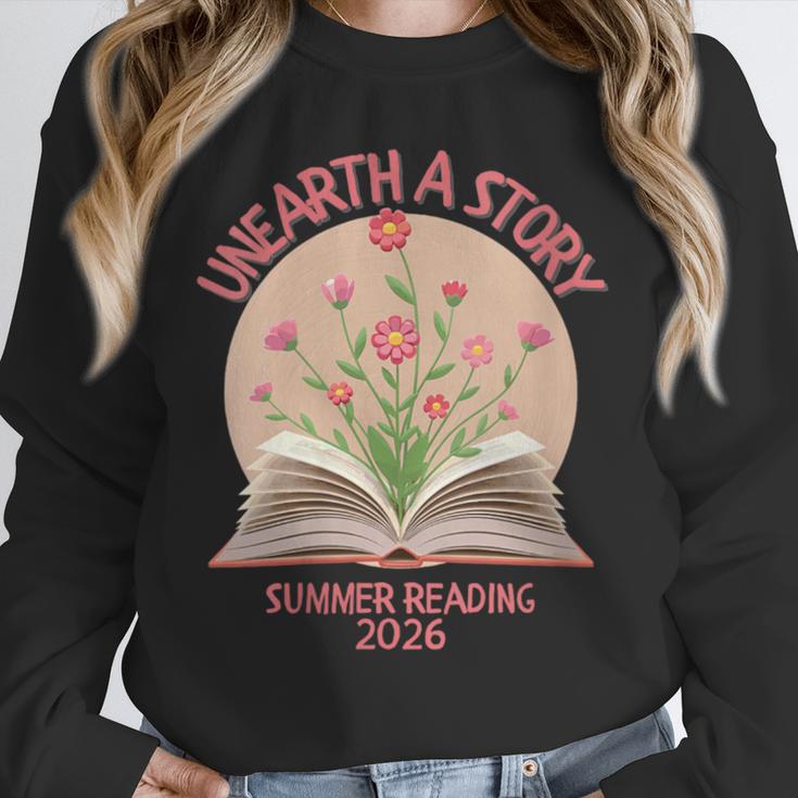 Women's Unearth a Story 2026 Summer Reading Program Flowers Book Unisex Sweatshirt Women's Unearth a Story 2026 Summer Reading Program Flowers Book Unisex Sweatshirt