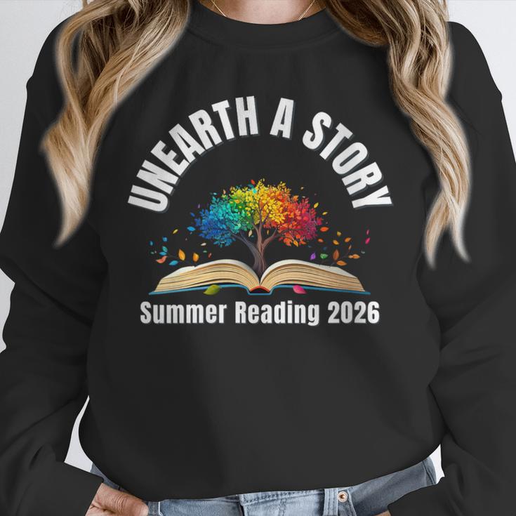 Women's Unearth a Story 2026 Summer Reading Program Tree Book Unisex Sweatshirt Women's Unearth a Story 2026 Summer Reading Program Tree Book Unisex Sweatshirt