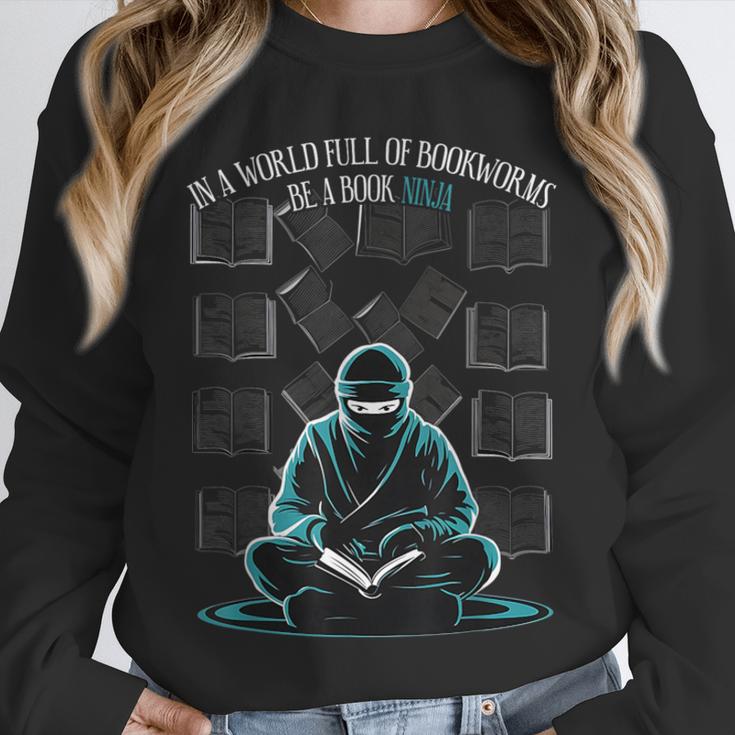 In A World Full Of Bookworms Be A Book Ninja Reading Reader Unisex Sweatshirt