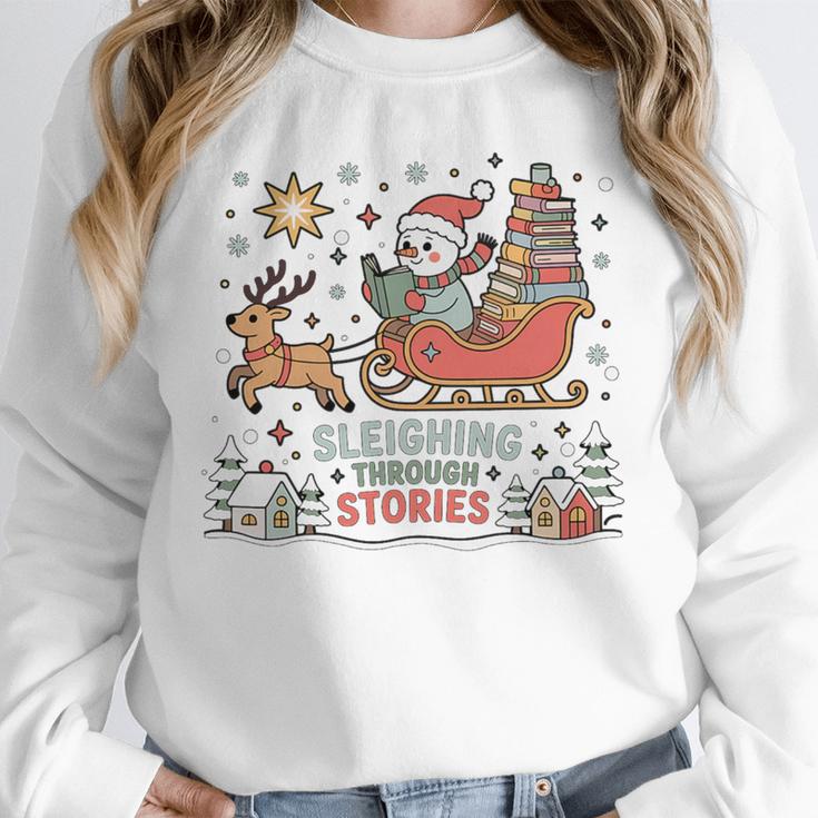 Book Lovers Winter Sleighing Through Stories Tee Premium Tri-Blend Unisex Sweatshirt
