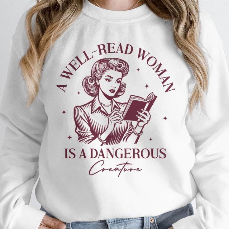 Books A Well-Read Woman Is A Dangerous Creature Women Premium Tri-Blend Unisex Sweatshirt