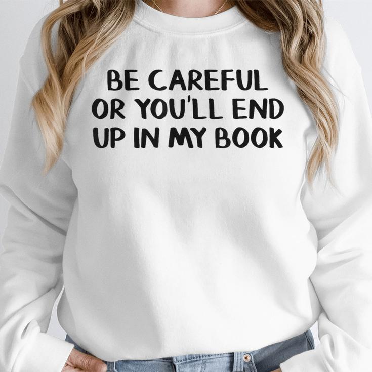 Be Careful Or You’Ll End Up In My Book Unisex Sweatshirt