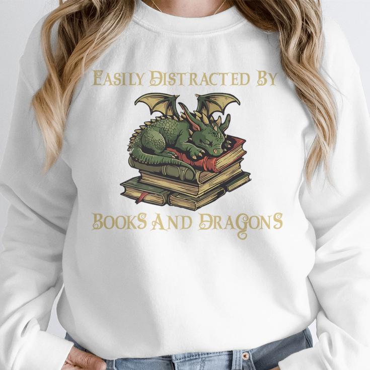 Easily Distracted By Books And Dragons Graphic Premium Unisex Sweatshirt