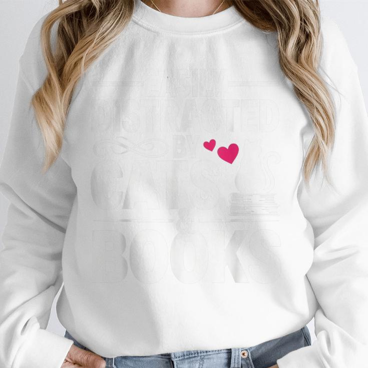 Easily Distracted By Cats And Books Cat & Book Lover Unisex Sweatshirt