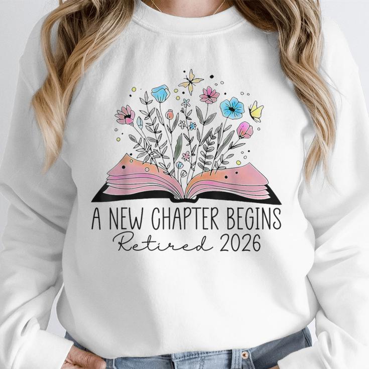 Floral Book A New Chapter Begins Retired 2026 Retirement Unisex Sweatshirt Floral Book A New Chapter Begins Retired 2026 Retirement Unisex Sweatshirt