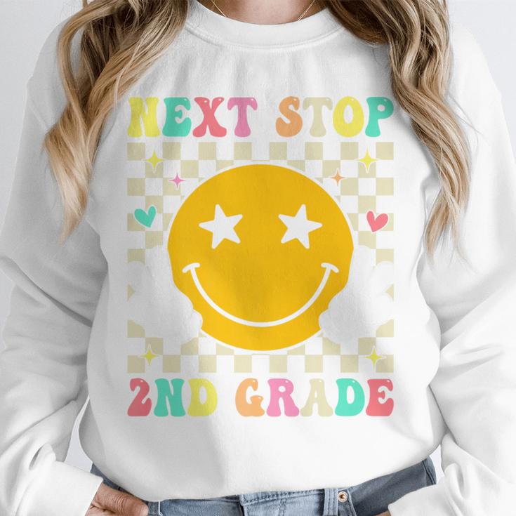 Groovy Next Stop 2nd Grade 1st Grade Graduation 2025 Premium Unisex Sweatshirt