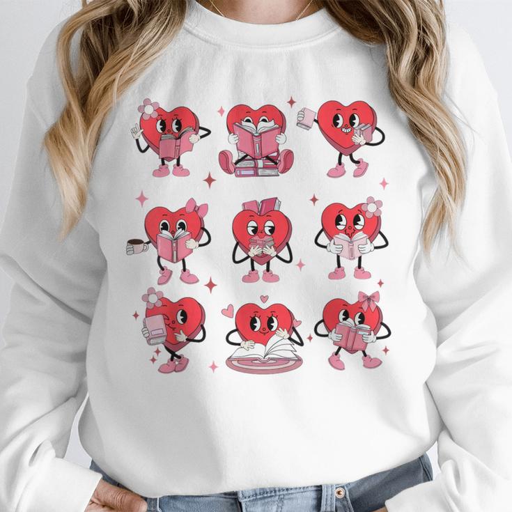 Heart Holding Reading Books Valentine Teacher Book Lover Unisex Sweatshirt