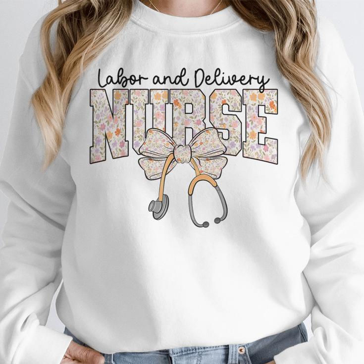Labor And Delivery Nurse Stethoscope Coquette Bow Graduation Unisex Sweatshirt