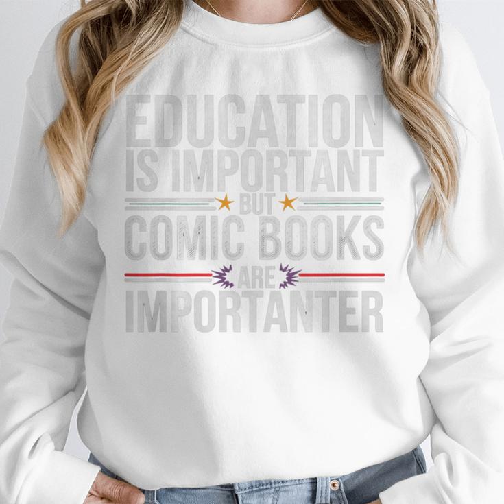 Who Needs Education Comic Books Are Importanter Premium Tri-Blend Unisex Sweatshirt