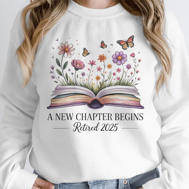 a New Chapter Begins Retired 2025 Floral Book Retirement Unisex Sweatshirt