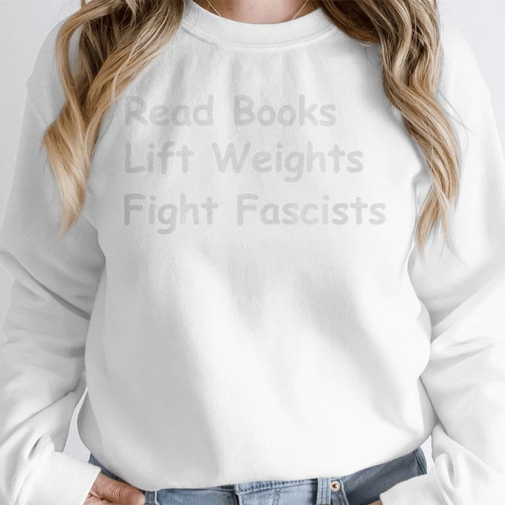 Read Books Lift Weights Fight Fascists Lovers Reading Premium Tri-Blend Unisex Sweatshirt