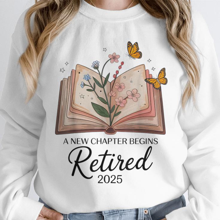 Retired 2025 A New Chapter Begins Retirement Teacher Book Unisex Sweatshirt