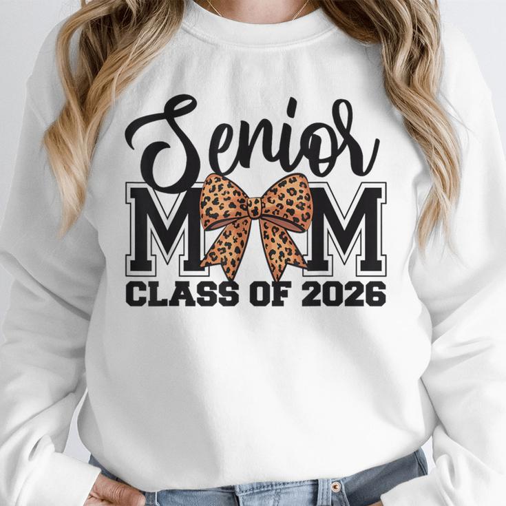 Senior Mom Class Of 2026 Graduation Leopard Coquette Bow Unisex Sweatshirt