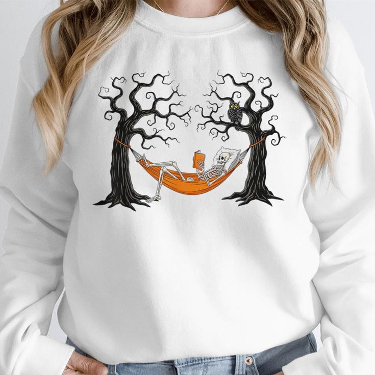 Skeleton Reading Book In Hammock Halloween Reader Unisex Sweatshirt