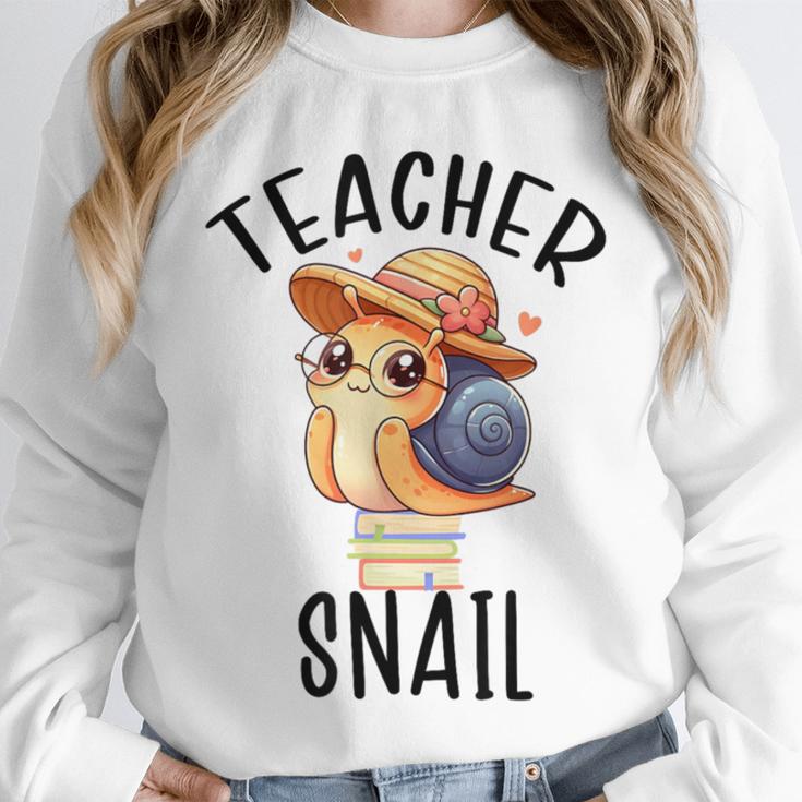 Teacher Snail With Glasses On Books Cute Pre-K Kindergarten Unisex Sweatshirt Teacher Snail With Glasses On Books Cute Pre-K Kindergarten Unisex Sweatshirt