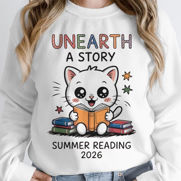 Unearth a Story Cute Kitten Summer Reading 2026 Cat Book Unisex Sweatshirt