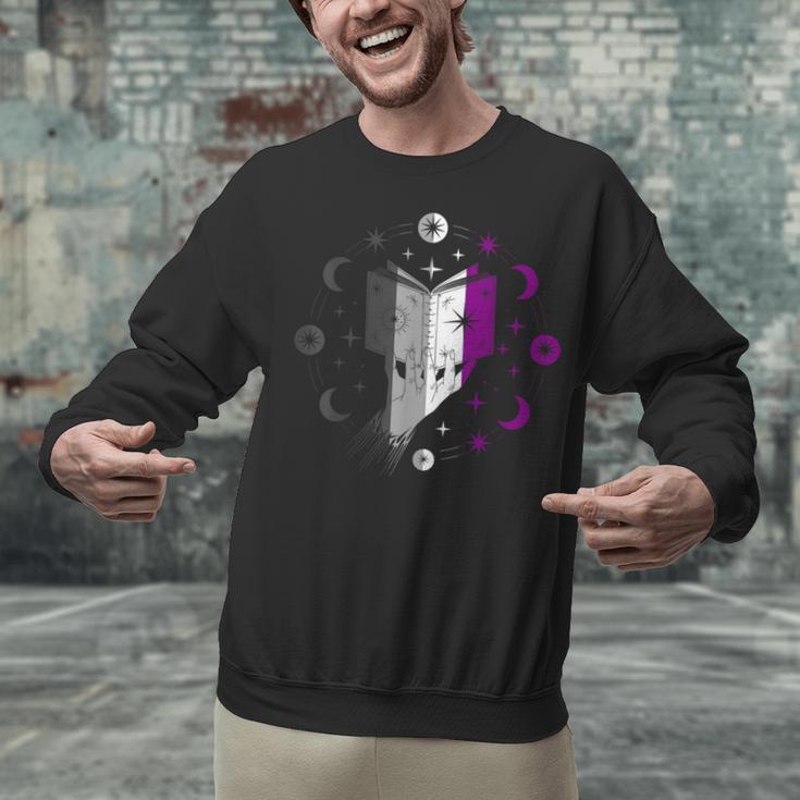 Ace Pride Book With Stars Moons And Magic Hand Unisex Sweatshirt