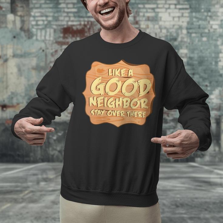 Antisocial Like A Good Neighbor Stay Over There Introvert Unisex Sweatshirt