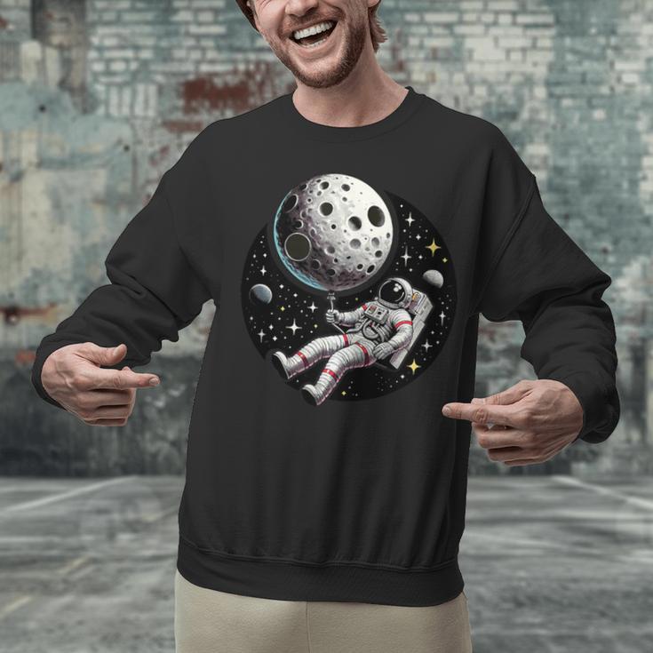 Astronaut Aesthetic Holding Moon Balloon Planets Introvert Unisex Sweatshirt Astronaut Aesthetic Holding Moon Balloon Planets Introvert Unisex Sweatshirt