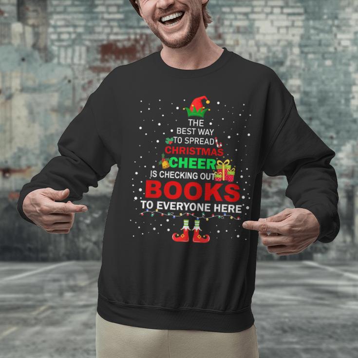 The Best Way To Spread Christmas Cheer Is Checking Out Books Unisex Sweatshirt The Best Way To Spread Christmas Cheer Is Checking Out Books Unisex Sweatshirt
