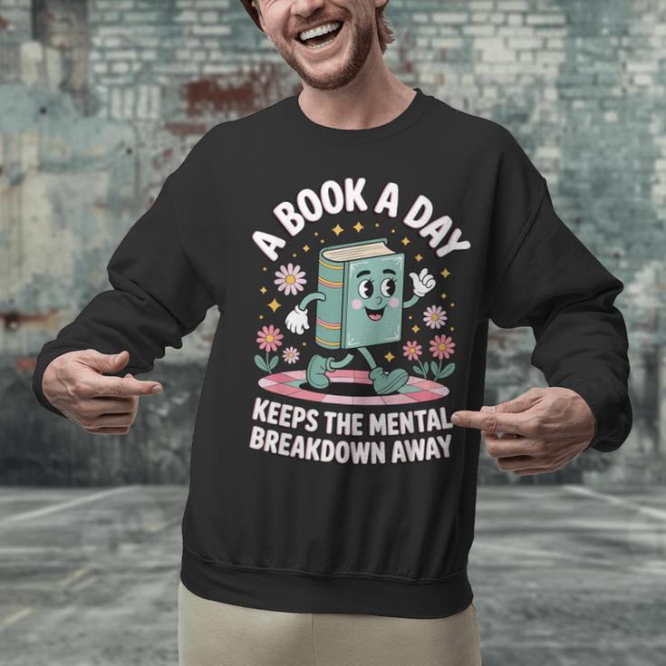 A Book A Day Keeps The Mental Breakdown Away Unisex Sweatshirt