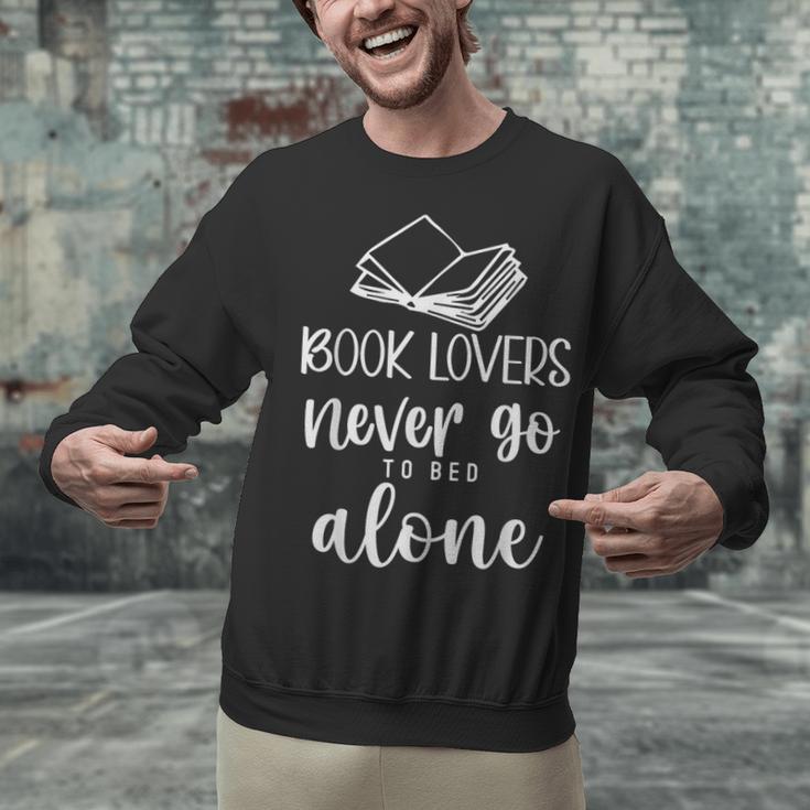 Book Lovers Never Go To Bed Alone Bibliophile Humor Unisex Sweatshirt