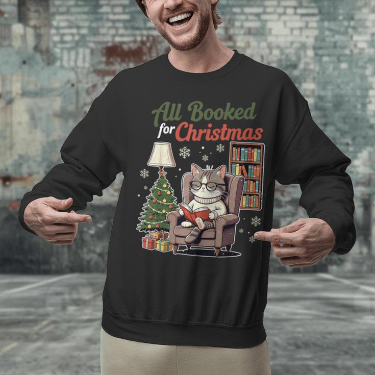 All Booked For Christmas Cute Bookish Cat Lover Unisex Sweatshirt