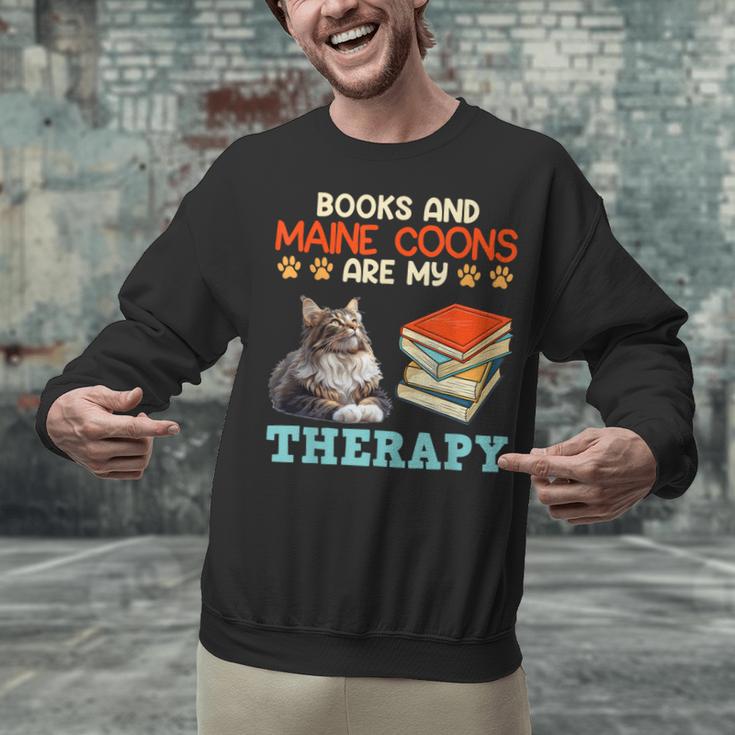 BOOKS AND MAINE COONS ARE MY THERAPY Main Coon Unisex Sweatshirt