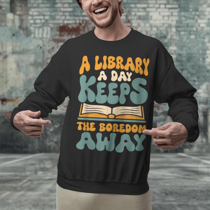 Borrow Books A Library A Day Keeps The Boredom Away Reading Unisex Sweatshirt