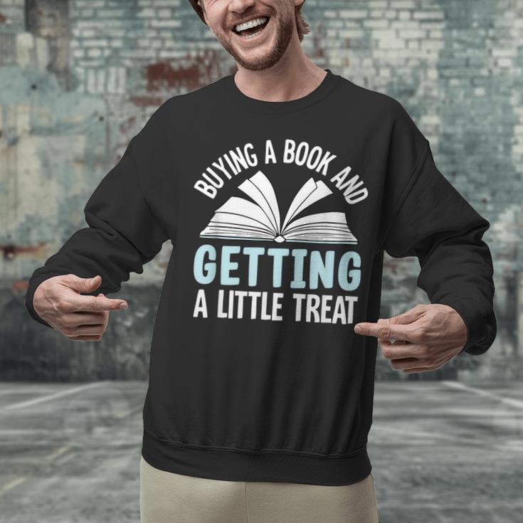 Buying A Book And Getting A Little Treat Unisex Sweatshirt