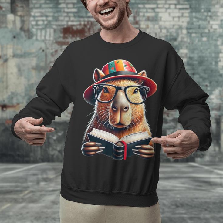 Capybara Bookworm Rodent Reading a Book Unisex Sweatshirt