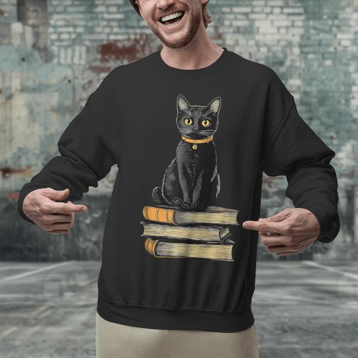 Cat Sitting On Books Unisex Sweatshirt