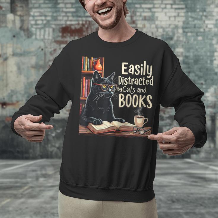 Cats And Books Book & Cat Lover Easily Distracted By Unisex Sweatshirt Cats And Books Book & Cat Lover Easily Distracted By Unisex Sweatshirt