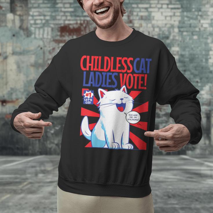Childless Cat Ladies Vote Kamala Harris Cute Comic Book Cat Unisex Sweatshirt Childless Cat Ladies Vote Kamala Harris Cute Comic Book Cat Unisex Sweatshirt