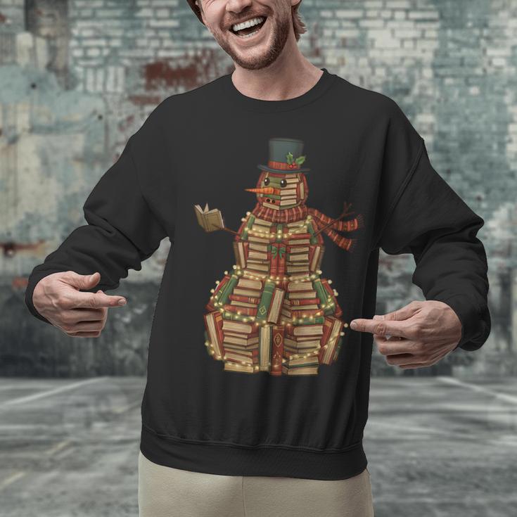 Christmas Snowman Made Of Books Holiday Reading Xmas Unisex Sweatshirt Christmas Snowman Made Of Books Holiday Reading Xmas Unisex Sweatshirt