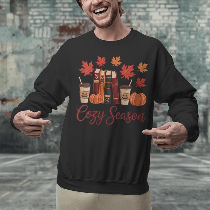 Cozy Season Autumn Leaves Books Pumpkins Fall Halloween Unisex Sweatshirt