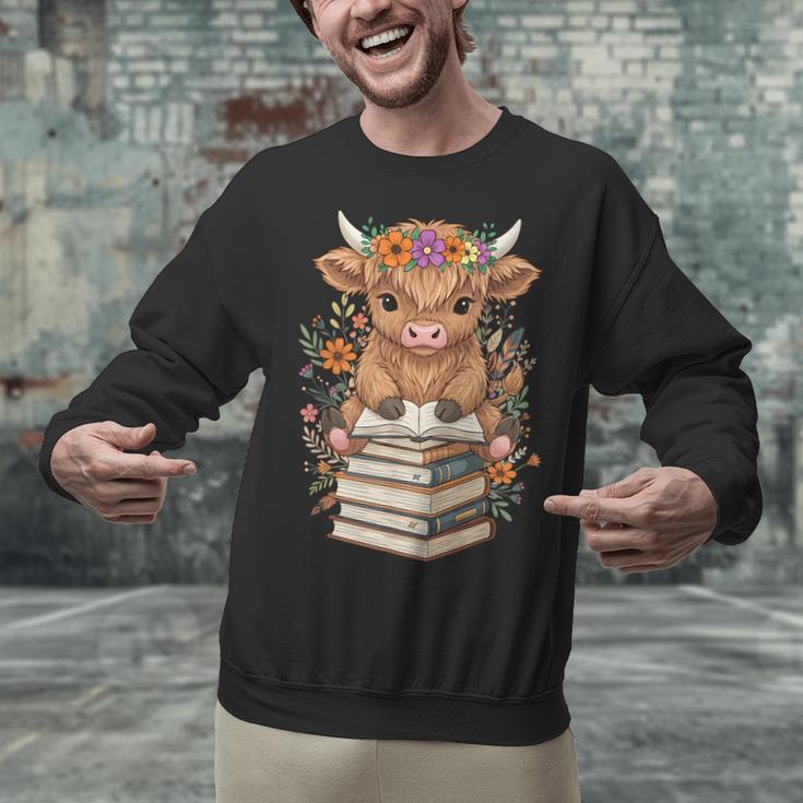 Cute Baby Highland Cow Reading Book Librarian Bookworm Unisex Sweatshirt Cute Baby Highland Cow Reading Book Librarian Bookworm Unisex Sweatshirt