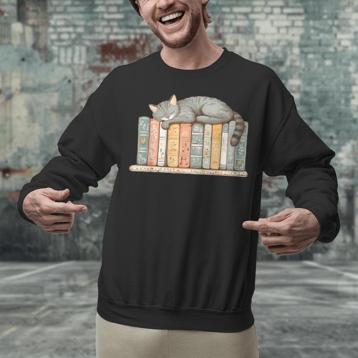 Cute Cat Sleeping On Books Unisex Sweatshirt