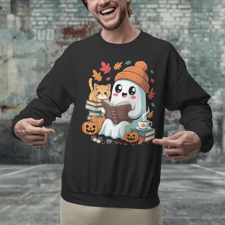 Cute Cozy Ghost Reading With Cat Book Lover Autumn Fall Unisex Sweatshirt Cute Cozy Ghost Reading With Cat Book Lover Autumn Fall Unisex Sweatshirt