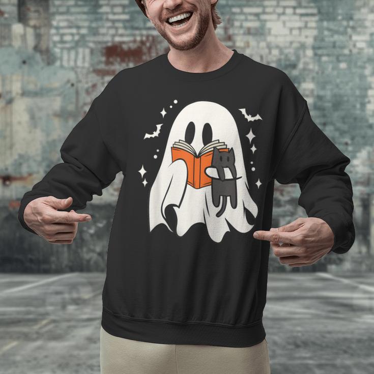 Cute Ghost Reading Book Spooky Season Halloween Costume Kids Unisex Sweatshirt