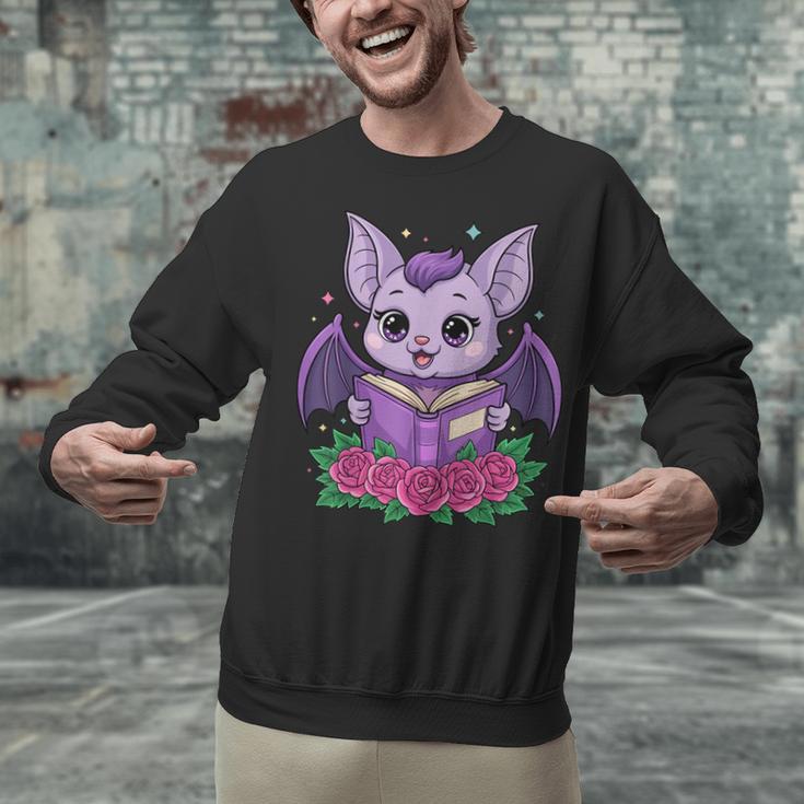 Cute Pastel Goth Bat Reading Book Unisex Sweatshirt
