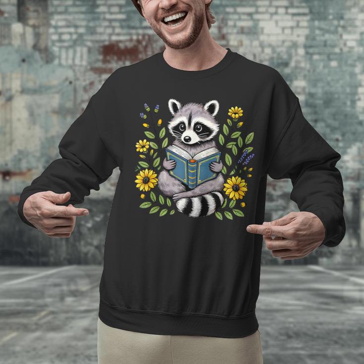 Cute Raccoon Reading Book Flowers Unisex Sweatshirt