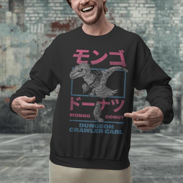 DCC Mongo And Donut Face-Off With Kanji Gamer Series Book Unisex Sweatshirt DCC Mongo And Donut Face-Off With Kanji Gamer Series Book Unisex Sweatshirt