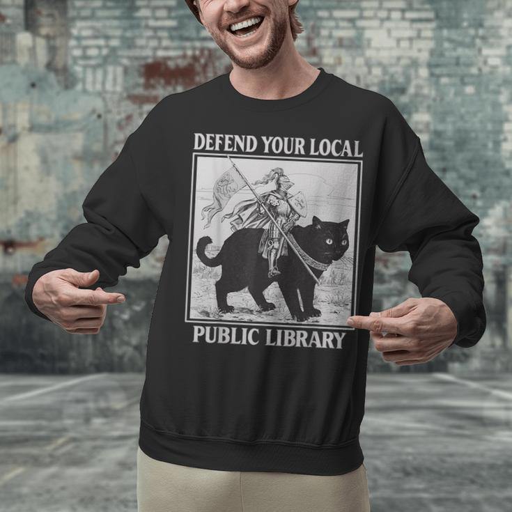 Defend Your Local Library Knight Cat Rider Book Lover Unisex Sweatshirt