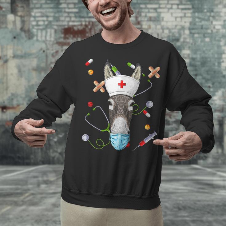 Donkey Nurse RN ER Nursing School Graduation Unisex Sweatshirt