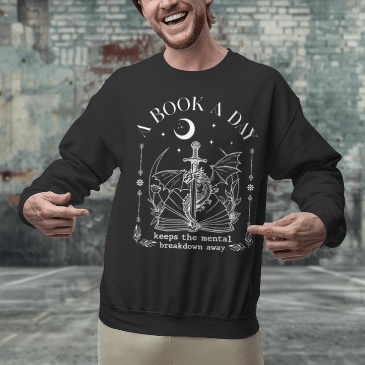 Dragon A Book A Day Keeps The Mental Breakdown Away Unisex Sweatshirt