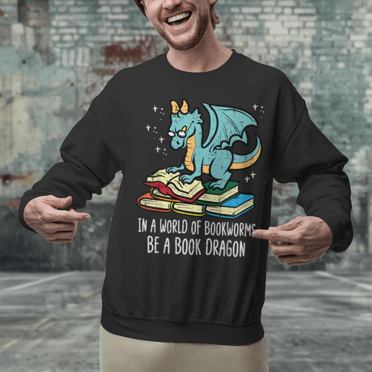 Be A Dragon Read Reading Book Librarian Men Women Kids Unisex Sweatshirt