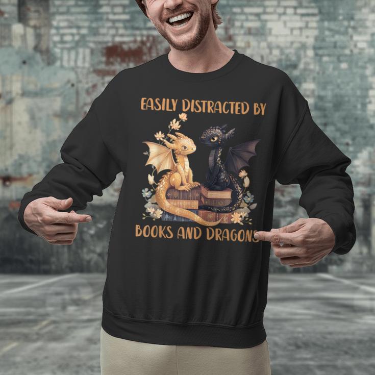 Easily Distracted By Books & Dragons Librarian Book Lover Unisex Sweatshirt